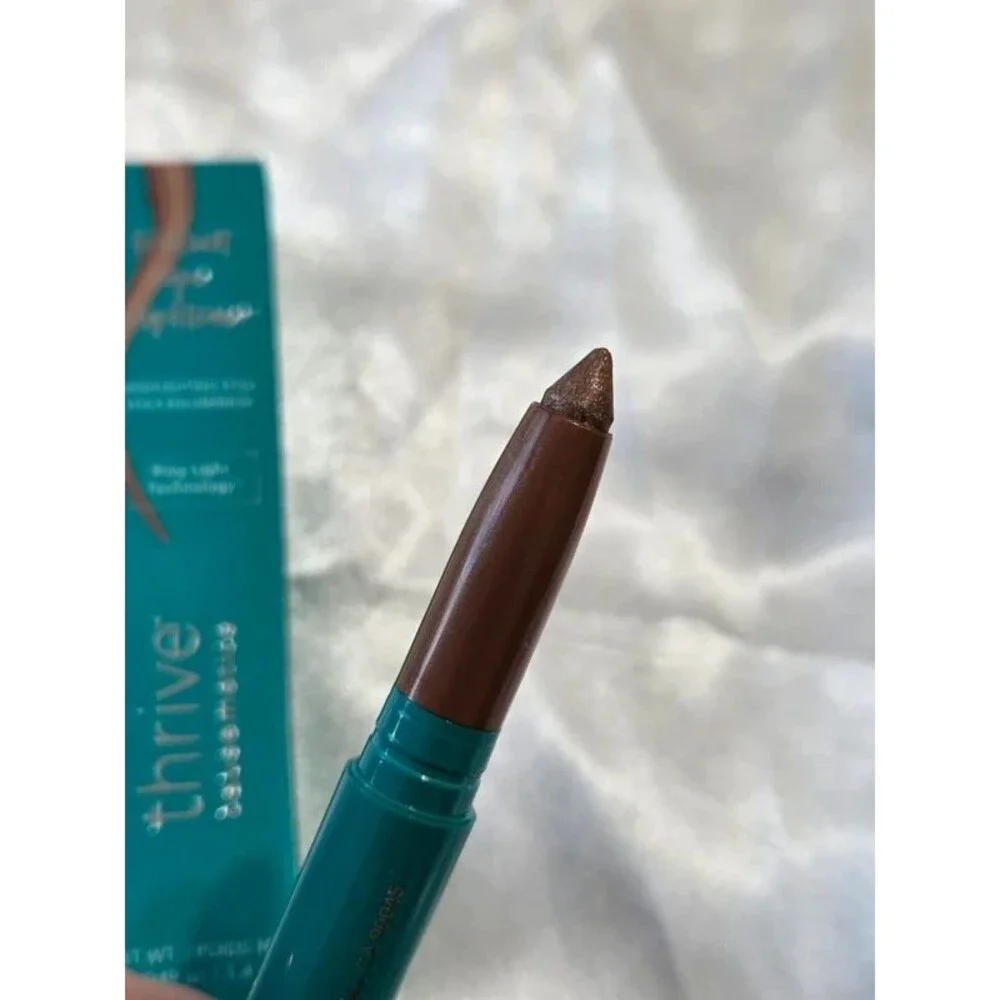 Thrive Brilliant Eye Brightener Stick - Pili (cool gold shimmer)